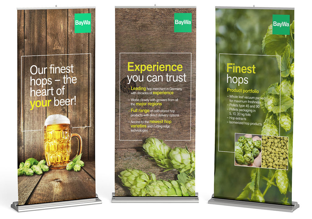 Drei Roll-up-Banner für den BayWa Hopfen Messeauftritt: Keyvisual, Produktargumente und Sortimentsübersicht im einheitlichen Corporate Design.